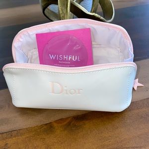 Dior pouch filled with lux fragrance samples
